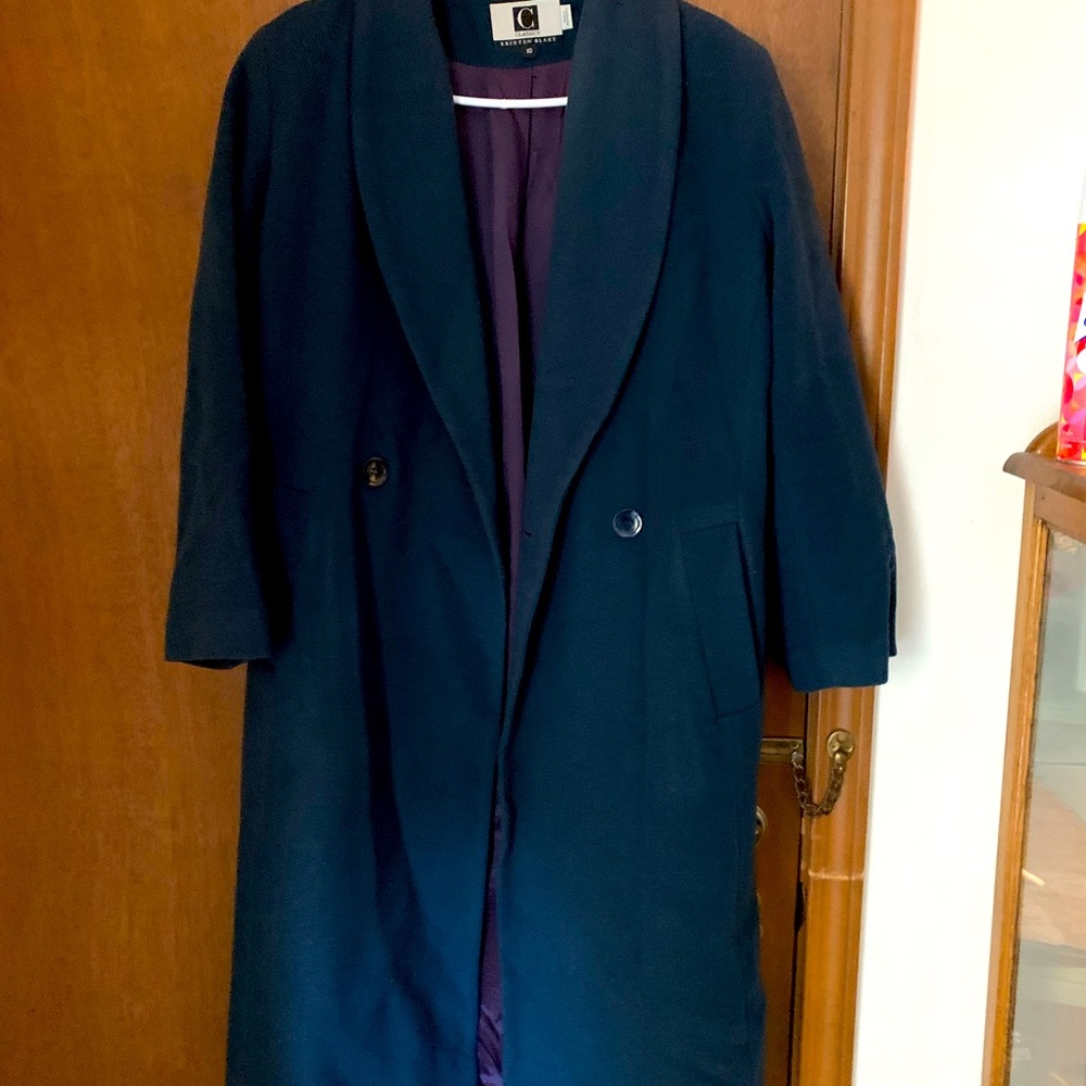 Nice full length coat. Dark blue in color size 10